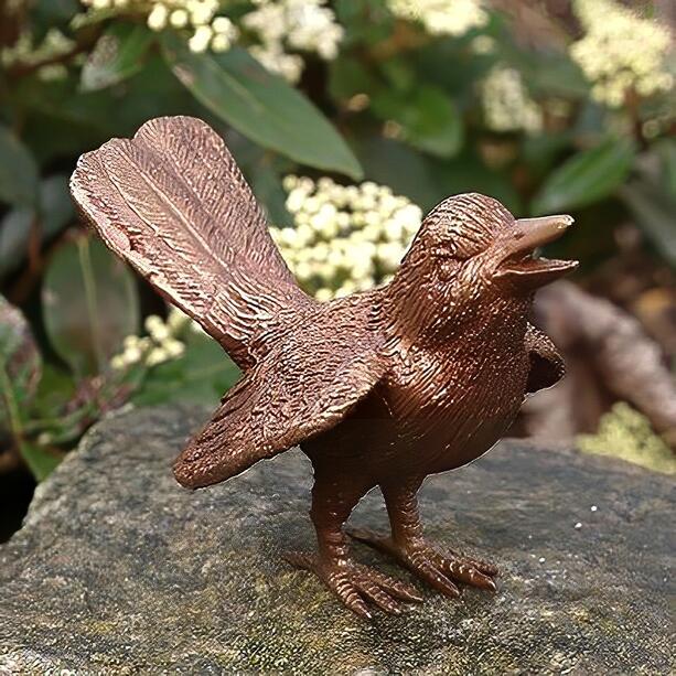 Zwitschernde Vogelfigur aus Bronzeguss als Grabschmuck - Tracko